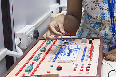 Brainware University computer science & engineering student performing test in lab